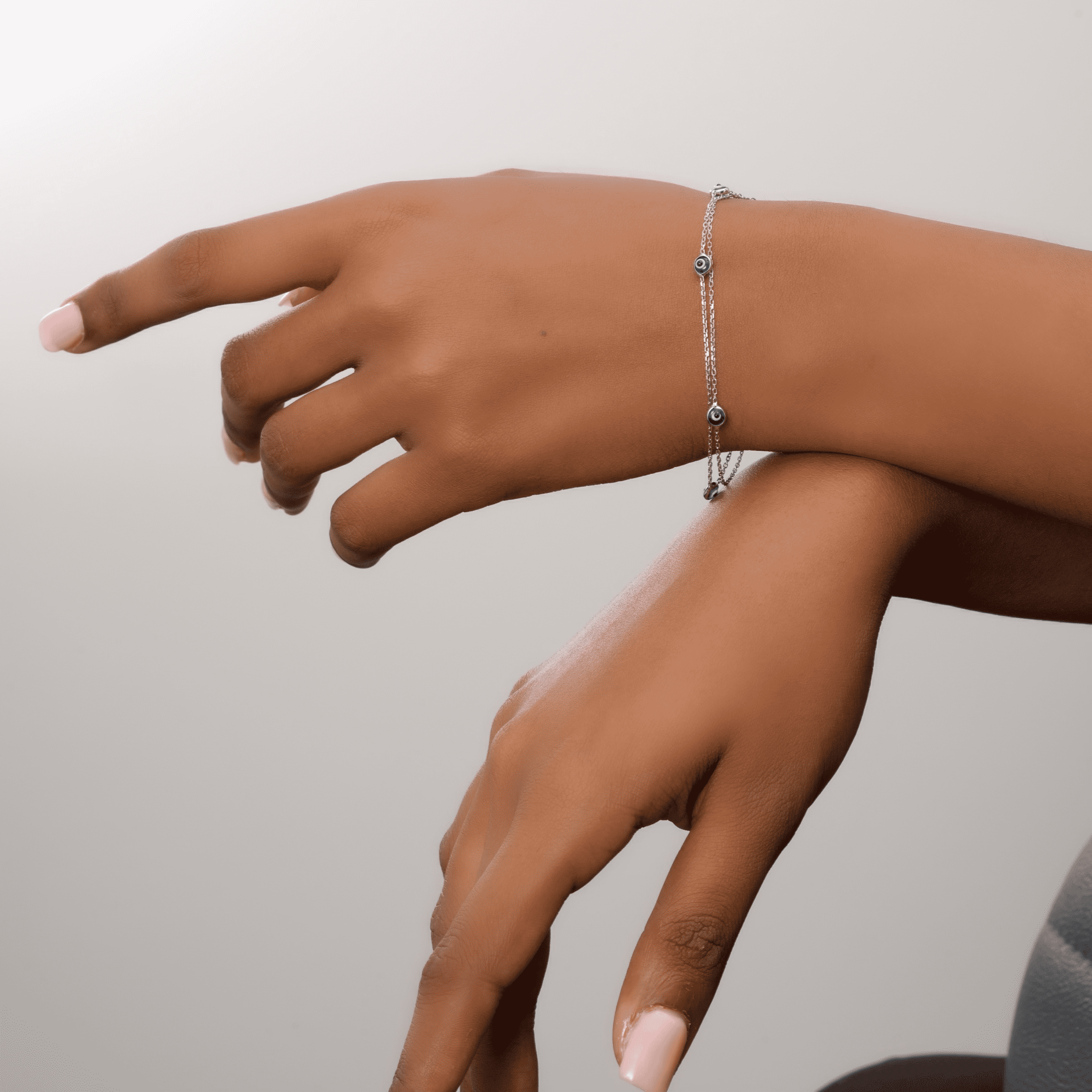 Dual Cushion Evil Eyes Wristliner